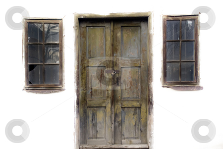To use this stock image in your creative project, please select the size you need over to the right and click the "Add to Cart" button.
Your downloaded image will come with the Cutcaster watermark removed so don’t worry about the watermark you see on this page. Entrance stock photo, Door and two windows on an old abandoned house by Ivan Paunovic