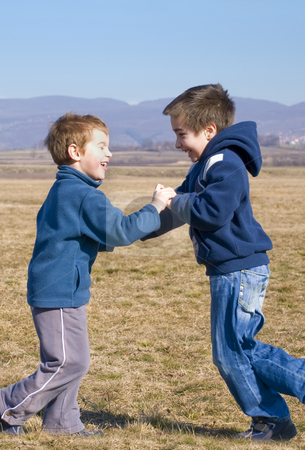 To use this stock image in your creative project, please select the size you need over to the right and click the "Add to Cart" button.
Your downloaded image will come with the Cutcaster watermark removed so don’t worry about the watermark you see on this page. Meeting stock photo, Two boy meet each other outside and laugh by Ivan Paunovic