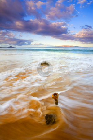 To use this stock image in your creative project, please select the size you need over to the right and click the "Add to Cart" button.
Your downloaded image will come with the Cutcaster watermark removed so don’t worry about the watermark you see on this page. Tide to the Sea stock photo, A Eyebolt left from an eroded and abandoned jetty awash in the waves of the incoming tide off the coast of Kihei , Maui, Hawaii. by Mike Dawson