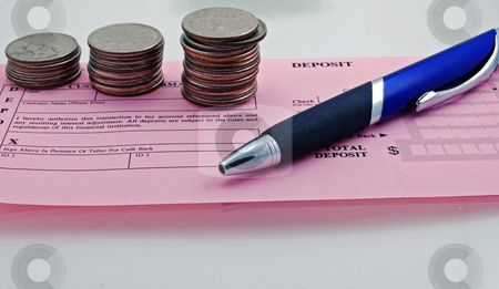 To use this stock image in your creative project, please select the size you need over to the right and click the "Add to Cart" button.
Your downloaded image will come with the Cutcaster watermark removed so don’t worry about the watermark you see on this page. Coins for Deposit stock photo, Coins with pen and deposit slip by Robert Cabrera