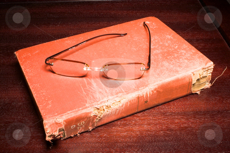 To use this stock image in your creative project, please select the size you need over to the right and click the "Add to Cart" button.
Your downloaded image will come with the Cutcaster watermark removed so don’t worry about the watermark you see on this page. Book and eading Glasses stock photo, Reading glasses and a book full of words and phrases. by Robert Byron