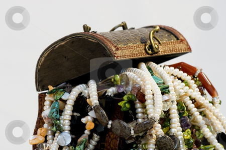 To use this stock image in your creative project, please select the size you need over to the right and click the "Add to Cart" button.
Your downloaded image will come with the Cutcaster watermark removed so don’t worry about the watermark you see on this page. Chest full of jewelry treasures stock photo, Chest full of jewelry treasures by Fesus Robert