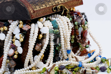 To use this stock image in your creative project, please select the size you need over to the right and click the "Add to Cart" button.
Your downloaded image will come with the Cutcaster watermark removed so don’t worry about the watermark you see on this page. Chest full of jewelry treasures stock photo, Chest full of jewelry treasures by Fesus Robert