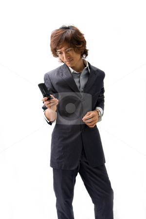 To use this stock image in your creative project, please select the size you need over to the right and click the "Add to Cart" button.
Your downloaded image will come with the Cutcaster watermark removed so don’t worry about the watermark you see on this page. Asian business man and phone stock photo, Young Asian business man with mobile phone texting, isolated by Paul Hakimata