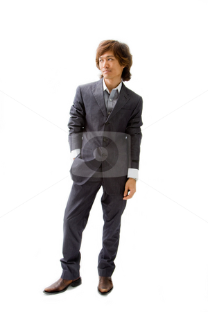 To use this stock image in your creative project, please select the size you need over to the right and click the "Add to Cart" button.
Your downloaded image will come with the Cutcaster watermark removed so don’t worry about the watermark you see on this page. Young Asian business man stock photo, Young Asian business man dressed in a gray pinstripe suit with hand in pocket, isolated by Paul Hakimata