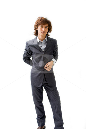 To use this stock image in your creative project, please select the size you need over to the right and click the "Add to Cart" button.
Your downloaded image will come with the Cutcaster watermark removed so don’t worry about the watermark you see on this page. Young Asian business man stock photo, Young Asian business man dressed in a gray pinstripe suit with hand on back and button, isolated by Paul Hakimata
