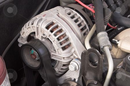 To use this stock image in your creative project, please select the size you need over to the right and click the "Add to Cart" button.
Your downloaded image will come with the Cutcaster watermark removed so don’t worry about the watermark you see on this page. Alternator stock photo, The power plant or alternator of an automobile. by Robert Byron