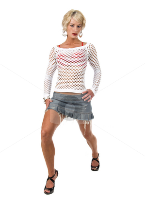 To use this stock image in your creative project, please select the size you need over to the right and click the "Add to Cart" button.
Your downloaded image will come with the Cutcaster watermark removed so don’t worry about the watermark you see on this page. Blonde model stock photo, Blonde fashion model in a denim skirt, net top and red bra.
Full body shot isolated over white. by Robert Deal