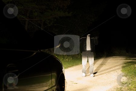 To use this stock image in your creative project, please select the size you need over to the right and click the "Add to Cart" button.
Your downloaded image will come with the Cutcaster watermark removed so don’t worry about the watermark you see on this page. Headless Man stock photo, A headless man standing on a road, with car headlights on him by Richard Nelson