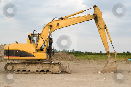 To use this stock image in your creative project, please select the size you need over to the right and click the "Add to Cart" button.
Your downloaded image will come with the Cutcaster watermark removed so don’t worry about the watermark you see on this page. Backhoe stock photo, Full view of a large backhoe sitting idle by Richard Nelson