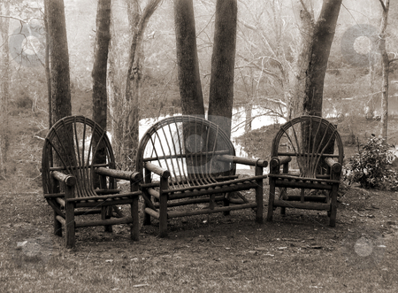 To use this stock image in your creative project, please select the size you need over to the right and click the "Add to Cart" button.
Your downloaded image will come with the Cutcaster watermark removed so don’t worry about the watermark you see on this page. Three chairs stock photo, A group of three old fashioned rustic chairs outdoors by Anita Peppers