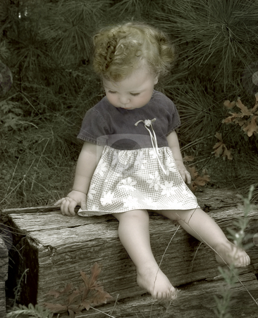To use this stock image in your creative project, please select the size you need over to the right and click the "Add to Cart" button.
Your downloaded image will come with the Cutcaster watermark removed so don’t worry about the watermark you see on this page. Summer baby stock photo, Vintage style selective coloring on black and white portrait of a baby sitting outdoors by Anita Peppers