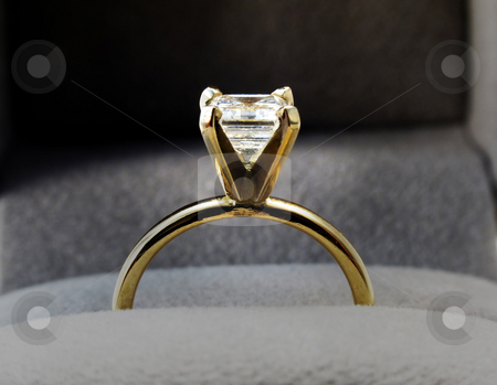 To use this stock image in your creative project, please select the size you need over to the right and click the "Add to Cart" button.
Your downloaded image will come with the Cutcaster watermark removed so don’t worry about the watermark you see on this page. Diamond ring stock photo, Diamond engagement ring by Anita Peppers