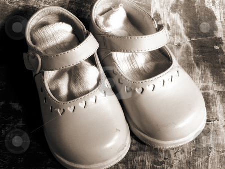 To use this stock image in your creative project, please select the size you need over to the right and click the "Add to Cart" button.
Your downloaded image will come with the Cutcaster watermark removed so don’t worry about the watermark you see on this page. Shoes stock photo, Little girl's shoes with socks by Anita Peppers