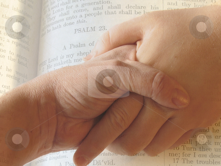 To use this stock image in your creative project, please select the size you need over to the right and click the "Add to Cart" button.
Your downloaded image will come with the Cutcaster watermark removed so don’t worry about the watermark you see on this page. Hands stock photo, Hands clasped in front of a bible page by Anita Peppers