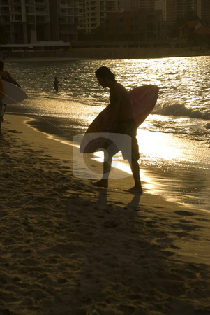 To use this stock image in your creative project, please select the size you need over to the right and click the "Add to Cart" button.
Your downloaded image will come with the Cutcaster watermark removed so don’t worry about the watermark you see on this page. Skin boarding afternoon stock photo, A skin board surfer at the beach by Stefan Breton