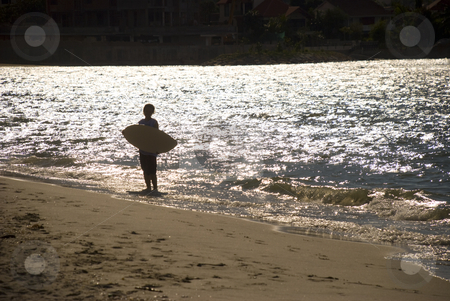 To use this stock image in your creative project, please select the size you need over to the right and click the "Add to Cart" button.
Your downloaded image will come with the Cutcaster watermark removed so don’t worry about the watermark you see on this page. Skin boarding afternoon stock photo, A skin board surfer at the beach by Stefan Breton