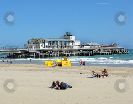 To use this stock image in your creative project, please select the size you need over to the right and click the "Add to Cart" button.
Your downloaded image will come with the Cutcaster watermark removed so don’t worry about the watermark you see on this page. Pier and Beach stock photo, A view of a beach, sea and a pier. by Lucy Clark