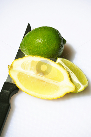 To use this stock image in your creative project, please select the size you need over to the right and click the "Add to Cart" button.
Your downloaded image will come with the Cutcaster watermark removed so don’t worry about the watermark you see on this page. Lime And Sliced Lemon stock photo, Fresh Lime and sliced Lemon on a light background with a knife. by Lynn Bendickson