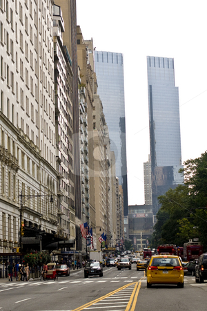 To use this stock image in your creative project, please select the size you need over to the right and click the "Add to Cart" button.
Your downloaded image will come with the Cutcaster watermark removed so don’t worry about the watermark you see on this page. Streetscape in New York City stock photo, View off w 59th st. in NY by Seph Daradar