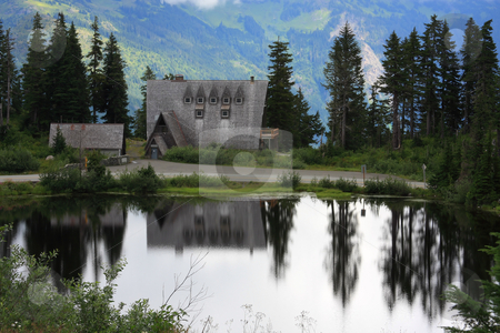 To use this stock image in your creative project, please select the size you need over to the right and click the "Add to Cart" button.
Your downloaded image will come with the Cutcaster watermark removed so don’t worry about the watermark you see on this page. Mountain Lake stock photo, A mountain lake with the reflection of an alpine lodge. by Steve Stedman