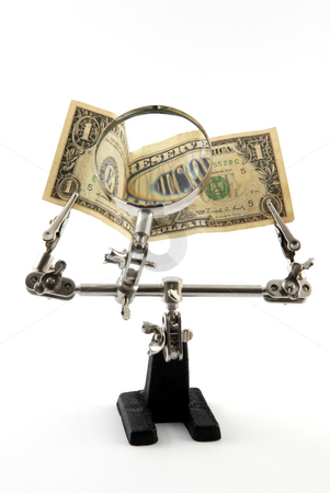 To use this stock image in your creative project, please select the size you need over to the right and click the "Add to Cart" button.
Your downloaded image will come with the Cutcaster watermark removed so don’t worry about the watermark you see on this page. Dollar banknote stock photo, Looking through magnifying glass to the dollar banknote by Csaba Zsarnowszky