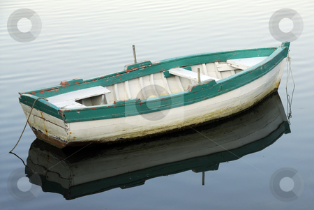 To use this stock image in your creative project, please select the size you need over to the right and click the "Add to Cart" button.
Your downloaded image will come with the Cutcaster watermark removed so don’t worry about the watermark you see on this page. Small fishing boat stock photo, Small fishing boat floating on the water by Csaba Zsarnowszky