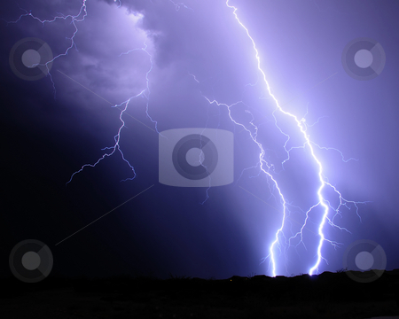 To use this stock image in your creative project, please select the size you need over to the right and click the "Add to Cart" button.
Your downloaded image will come with the Cutcaster watermark removed so don’t worry about the watermark you see on this page. Desert Lightning stock photo, Desert Lightning by Richard Valdez