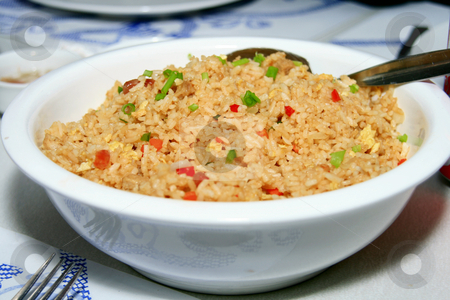 To use this stock image in your creative project, please select the size you need over to the right and click the "Add to Cart" button.
Your downloaded image will come with the Cutcaster watermark removed so don’t worry about the watermark you see on this page. Fried rice stock photo, Yummy fried rice served in a bowl by Jonas Marcos San Luis