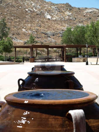 To use this stock image in your creative project, please select the size you need over to the right and click the "Add to Cart" button.
Your downloaded image will come with the Cutcaster watermark removed so don’t worry about the watermark you see on this page. Picnic Area Fountains stock photo, Picnic Area Fountains by Joseph Ligori