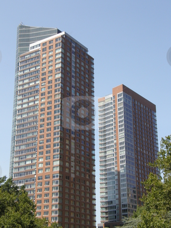 To use this stock image in your creative project, please select the size you need over to the right and click the "Add to Cart" button.
Your downloaded image will come with the Cutcaster watermark removed so don’t worry about the watermark you see on this page. Skyscraper in New York City stock photo, by Ritu Jethani