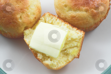 To use this stock image in your creative project, please select the size you need over to the right and click the "Add to Cart" button.
Your downloaded image will come with the Cutcaster watermark removed so don’t worry about the watermark you see on this page. Cornbread Muffins stock photo, Delicious cornbread muffins: a southern USA tradition. by Robert Byron