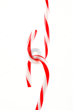 To use this stock image in your creative project, please select the size you need over to the right and click the "Add to Cart" button.
Your downloaded image will come with the Cutcaster watermark removed so don’t worry about the watermark you see on this page. Candy Canes stock photo, Candy canes ready for the holidays. by Robert Byron