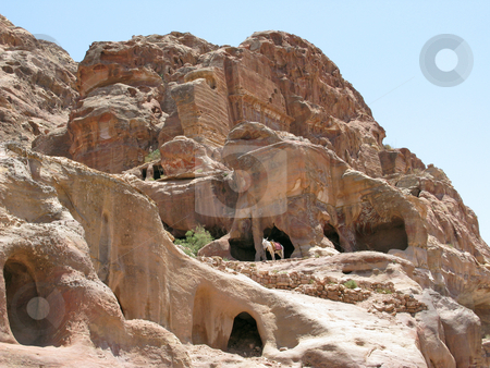 To use this stock image in your creative project, please select the size you need over to the right and click the "Add to Cart" button.
Your downloaded image will come with the Cutcaster watermark removed so don’t worry about the watermark you see on this page. Mountains of Petra stock photo, Ruins of Petra, Jordan, Middle east by Roman Vintonyak