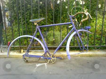 To use this stock image in your creative project, please select the size you need over to the right and click the "Add to Cart" button.
Your downloaded image will come with the Cutcaster watermark removed so don’t worry about the watermark you see on this page. Old bike stock photo, Old bike leaning on a fence by Heiko Riemann