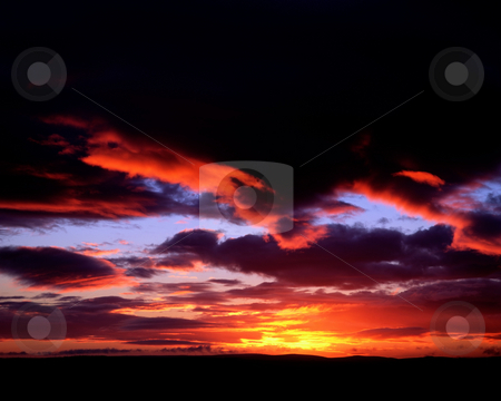 To use this stock image in your creative project, please select the size you need over to the right and click the "Add to Cart" button.
Your downloaded image will come with the Cutcaster watermark removed so don’t worry about the watermark you see on this page. MPIXIS250509 stock photo, Sunset over cloudy sky by Mpixis World
