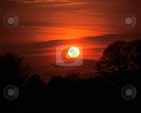 To use this stock image in your creative project, please select the size you need over to the right and click the "Add to Cart" button.
Your downloaded image will come with the Cutcaster watermark removed so don’t worry about the watermark you see on this page. MPIXIS250518 stock photo, Sunset over hills by Mpixis World