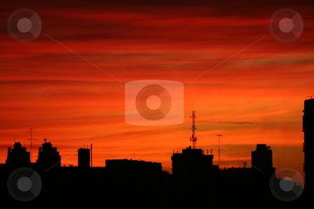 To use this stock image in your creative project, please select the size you need over to the right and click the "Add to Cart" button.
Your downloaded image will come with the Cutcaster watermark removed so don’t worry about the watermark you see on this page. City at dawn stock photo, Silhouette of buildings in front of an orange sky at dawn by Johannes Reschl