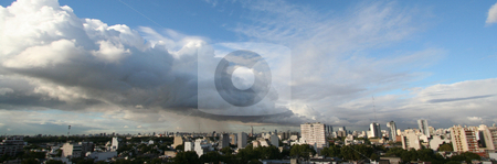To use this stock image in your creative project, please select the size you need over to the right and click the "Add to Cart" button.
Your downloaded image will come with the Cutcaster watermark removed so don’t worry about the watermark you see on this page. Buenos Aires cloud wall stock photo, A wall of clouds slides from the right side over the panorama view of the city of Buenos Aires by Johannes Reschl