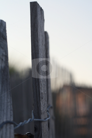 To use this stock image in your creative project, please select the size you need over to the right and click the "Add to Cart" button.
Your downloaded image will come with the Cutcaster watermark removed so don’t worry about the watermark you see on this page. Fence along the sand stock photo, by Caitlin Giles
