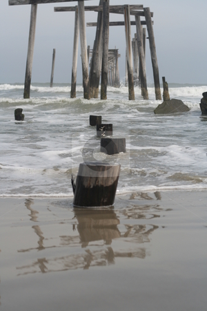 To use this stock image in your creative project, please select the size you need over to the right and click the "Add to Cart" button.
Your downloaded image will come with the Cutcaster watermark removed so don’t worry about the watermark you see on this page. Ocean Pier stock photo, Ocean pier. by Caitlin Giles