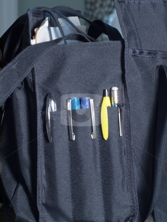 To use this stock image in your creative project, please select the size you need over to the right and click the "Add to Cart" button.
Your downloaded image will come with the Cutcaster watermark removed so don’t worry about the watermark you see on this page. Soft Briefcase stock photo, Soft Briefcase holding pens, pencils, folders and papers by Joseph Ligori