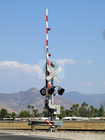 To use this stock image in your creative project, please select the size you need over to the right and click the "Add to Cart" button.
Your downloaded image will come with the Cutcaster watermark removed so don’t worry about the watermark you see on this page. Railroad Crossing Signa stock photo, Railroad Crossing Signal by Joseph Ligori