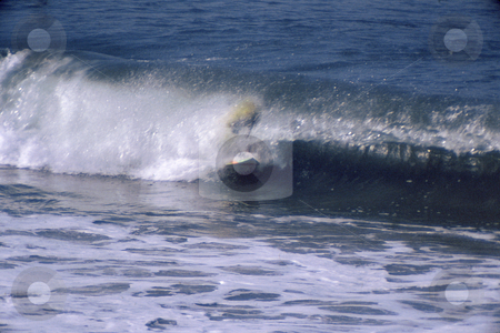 To use this stock image in your creative project, please select the size you need over to the right and click the "Add to Cart" button.
Your downloaded image will come with the Cutcaster watermark removed so don’t worry about the watermark you see on this page. Engulfed Surfer stock photo, Surfer engulfed in wave by Joseph Ligori