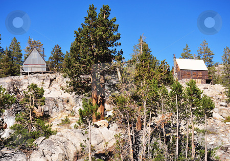 To use this stock image in your creative project, please select the size you need over to the right and click the "Add to Cart" button.
Your downloaded image will come with the Cutcaster watermark removed so don’t worry about the watermark you see on this page. Sierra Mountain Cabins stock photo, Two mountain cabins sit atop a solid bedrock hilltop in the California Sierra Nevada Mountains. by Lynn Bendickson