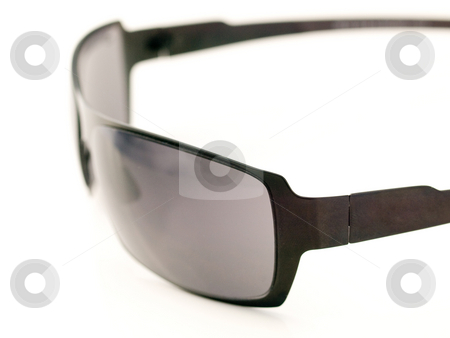 To use this stock image in your creative project, please select the size you need over to the right and click the "Add to Cart" button.
Your downloaded image will come with the Cutcaster watermark removed so don’t worry about the watermark you see on this page. Sunglasses closeup stock photo, Black pair ofsunglasses with shallow depth of field against white background by Laurent Dambies
