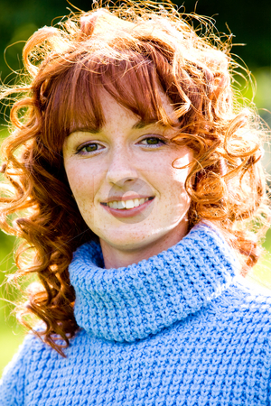 To use this stock image in your creative project, please select the size you need over to the right and click the "Add to Cart" button.
Your downloaded image will come with the Cutcaster watermark removed so don’t worry about the watermark you see on this page. Bright portrait of red-haired young woman outdoors stock photo, Close-up bright portrait of red-haired lovely young woman outdoors by Vitaly Sokolovskiy