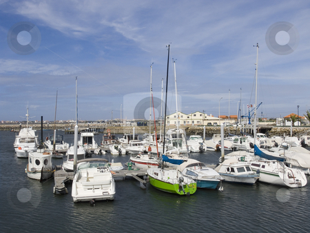 To use this stock image in your creative project, please select the size you need over to the right and click the "Add to Cart" button.
Your downloaded image will come with the Cutcaster watermark removed so don’t worry about the watermark you see on this page. Boat on harbor stock photo, Boat on harbor - Costa Nova, Portugal by Paulo Resende