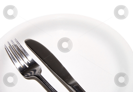 To use this stock image in your creative project, please select the size you need over to the right and click the "Add to Cart" button.
Your downloaded image will come with the Cutcaster watermark removed so don’t worry about the watermark you see on this page. Dinnerware stock photo, A plate, fork and knife ready for some food. by Robert Byron