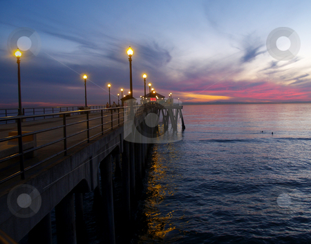 To use this stock image in your creative project, please select the size you need over to the right and click the "Add to Cart" button.
Your downloaded image will come with the Cutcaster watermark removed so don’t worry about the watermark you see on this page. Huntington Beach Pier stock photo, by Timothy OLeary